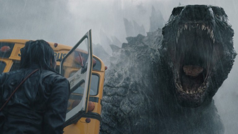 Godzilla screams at a schoolbus in Apple TV+'s Monarch: Legacy of Monsters.