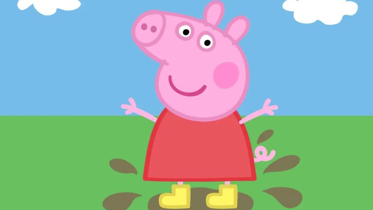 Peppa Pig jumping in a muddy puddle
